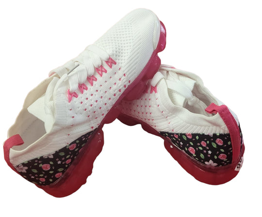 Lace up ladies' sneakers with flowers print fabric..