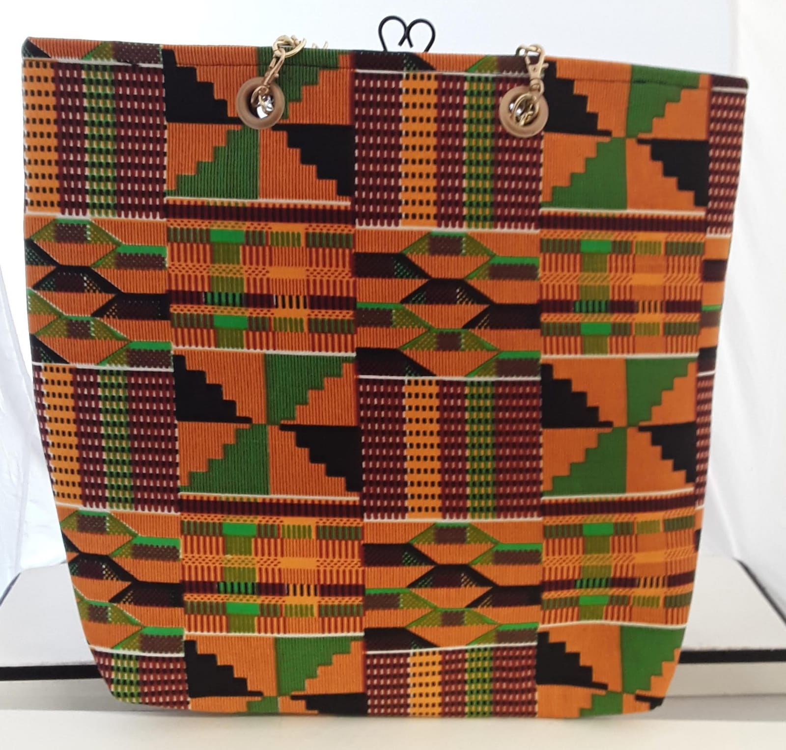 Leather pouch with brown kente